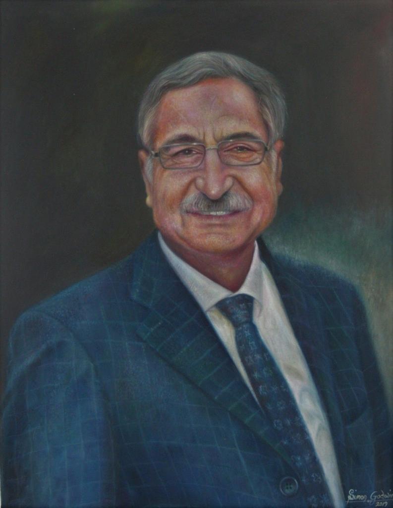 Hyperrealistic oil portrait of Mayor Nidai Gungordu by Simon Erhimu